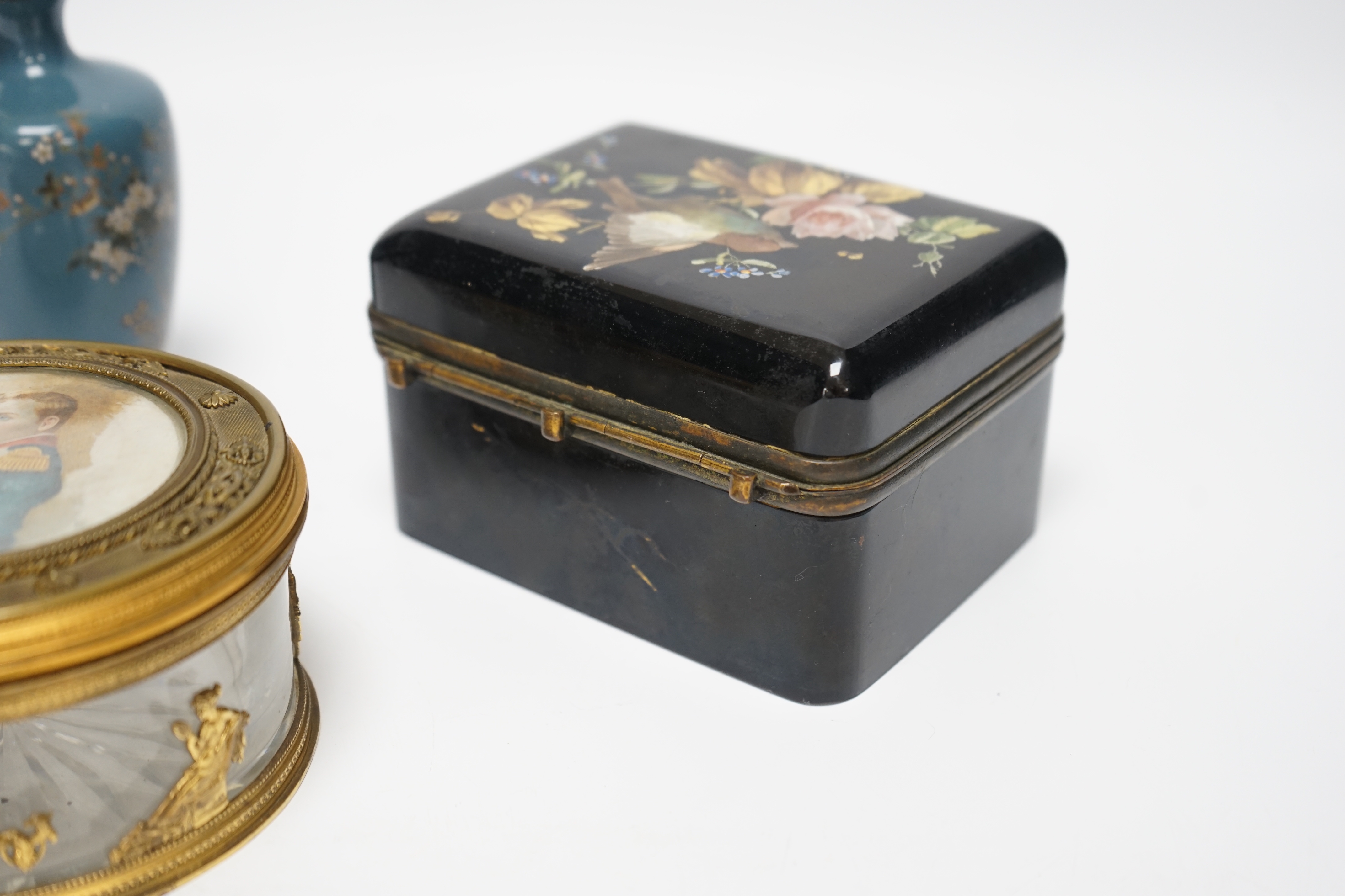 A Palais Royale circular gilt metal cut glass box with an inset portrait miniature of Napoleon on ivorine, 12cm diameter, a Bohemian enamelled glass box attributed to Moser, 12.5cm wide, a Japanese cloisonné enamel vase